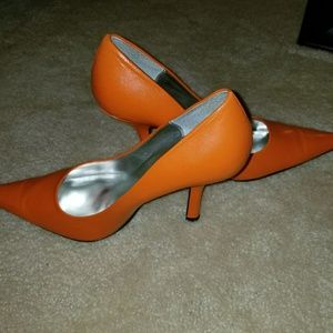 Orange pumps